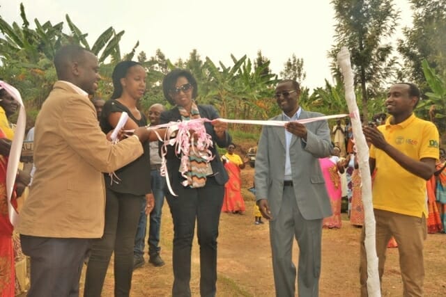 Cutting the ribbon from left to right Tona Isibo Global Communities representative Beatrice Umwiza IM Representative Innocent Benineza DUHAMIC Executive Secretary DUHAMIC – ADRI Cutting the ribbon from left to right Tona Isibo Global Communities representative Beatrice Umwiza IM Representative Innocent Benineza DUHAMIC Executive Secretary DUHAMIC – ADRI