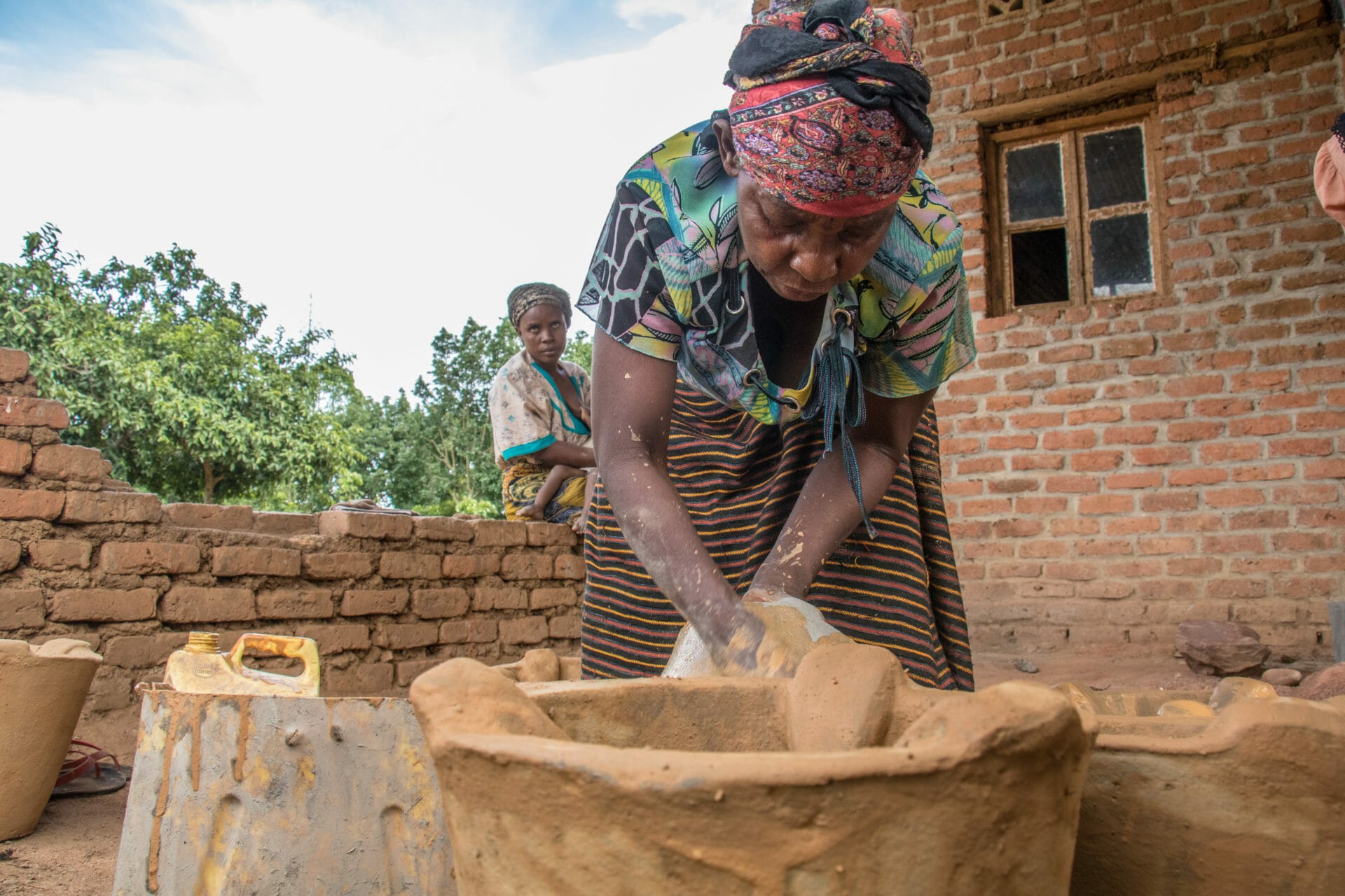 woman making pottery